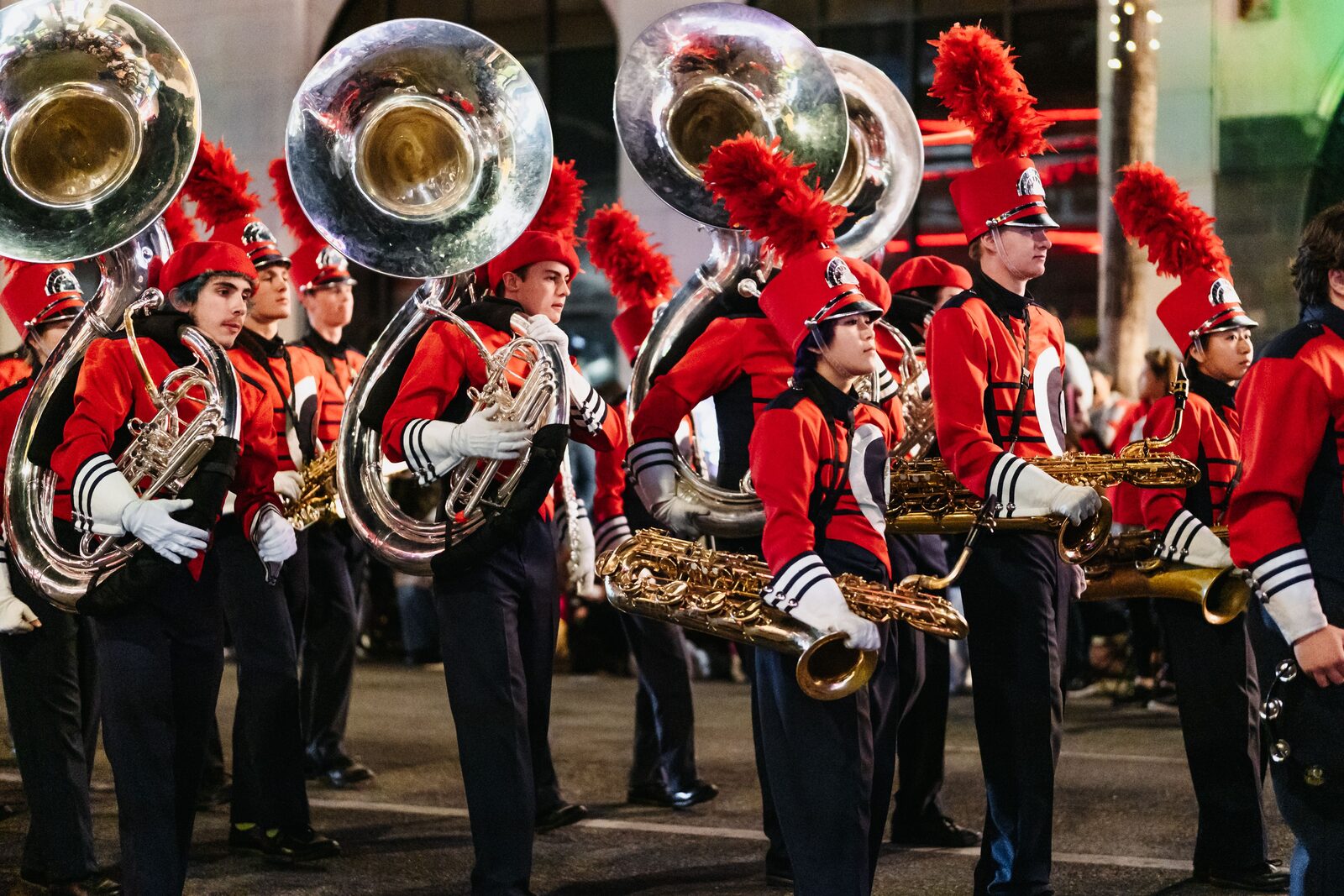 Marching band performing with brass and woodwind instruments